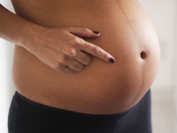 Bụng bầu thấp khi mang thai bé trai